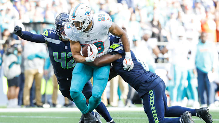 Sep 22, 2024; Seattle, Washington, USA; Miami Dolphins tight end Julian Hill (89) runs for yards after the catch against the Seattle Seahawks during the fourth quarter at Lumen Field. Mandatory Credit: Joe Nicholson-Imagn Images Sep 22, 2024; Seattle, Washington, USA; Miami Dolphins tight end Julian Hill (89) runs for yards after the catch against the Seattle Seahawks during the fourth quarter at Lumen Field. Mandatory Credit: Joe Nicholson-Imagn Images