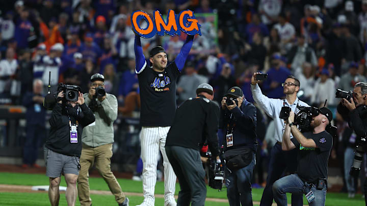 Holding an 'OMG' sign aloft, infielder José Iglesias was a key figure for the Mets postseason run in 2024. Should the Twins add him at short?