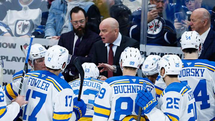 Jan 20, 2026; Winnipeg, Manitoba, CAN; St. Louis Blues coach Jim Montgomery strategizes against the Winnipeg Jets during the third period at Canada Life Centre. Mandatory Credit: Terrence Lee-Imagn Images