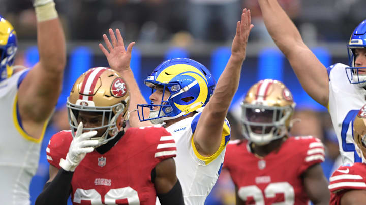 Sep 22, 2024; Inglewood, California, USA; Los Angeles Rams place kicker Joshua Karty (16), center, celebrates after scoring the game winning field goal in the fourth quarter against the San Francisco 49ers at SoFi Stadium. Mandatory Credit: Jayne Kamin-Oncea-Imagn Images Sep 22, 2024; Inglewood, California, USA; Los Angeles Rams place kicker Joshua Karty (16), center, celebrates after scoring the game winning field goal in the fourth quarter against the San Francisco 49ers at SoFi Stadium. Mandatory Credit: Jayne Kamin-Oncea-Imagn Images