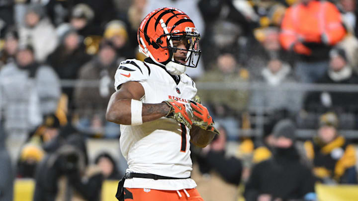 Jan 4, 2025; Pittsburgh, Pennsylvania, USA; Cincinnati Bengals wide receiver Ja'Marr Chase (1) celebrates after a touchdown pass against the Pittsburgh Steelers during the first quarter at Acrisure Stadium. Mandatory Credit: Barry Reeger-Imagn Images Jan 4, 2025; Pittsburgh, Pennsylvania, USA; Cincinnati Bengals wide receiver Ja'Marr Chase (1) celebrates after a touchdown pass against the Pittsburgh Steelers during the first quarter at Acrisure Stadium. Mandatory Credit: Barry Reeger-Imagn Images