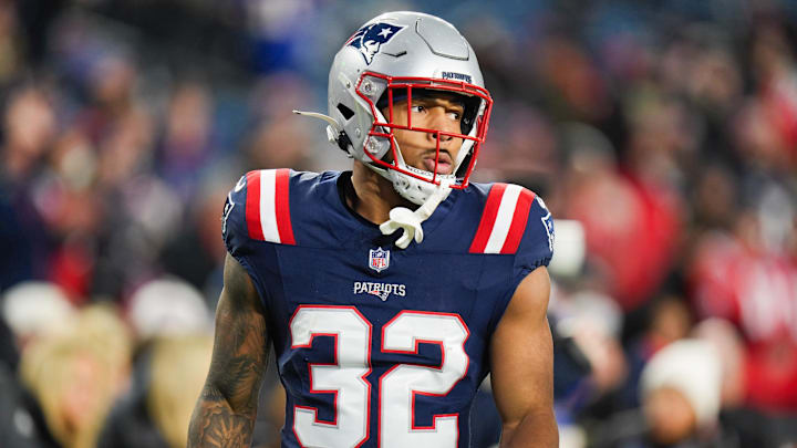 New England Patriots running back Treveyon Henderson (32) looks on before the game against the Los Angeles Chargers in an AFC Wild Card Round game at Gillette Stadium. 