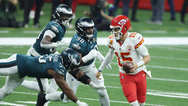 Feb 9, 2025; New Orleans, LA, USA; Kansas City Chiefs quarterback Patrick Mahomes (15) scrambles away from Philadelphia Eagles defensive end Brandon Graham (55) in the third quarter in Super Bowl LIX at Ceasars Superdome. Mandatory Credit: Stephen Lew-Imagn Images Feb 9, 2025; New Orleans, LA, USA; Kansas City Chiefs quarterback Patrick Mahomes (15) scrambles away from Philadelphia Eagles defensive end Brandon Graham (55) in the third quarter in Super Bowl LIX at Ceasars Superdome. Mandatory Credit: Stephen Lew-Imagn Images