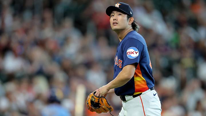 Houston Astros pitcher Tatsuya Imai (45) walks to the dugout after retiring the side. 