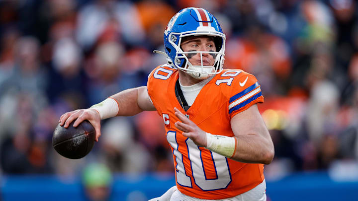 Denver Broncos quarterback Bo Nix (10) looks to pass in the third quarter against the Kansas City Chiefs at Empower Field at Mile High. 