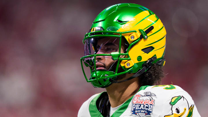 Oregon quarterback Dante Moore warms up as the Oregon Ducks face the Indiana Hoosiers in the Peach Bowl on Jan. 9, 2026, at Mercedes-Benz Stadium in Atlanta, Georgia.