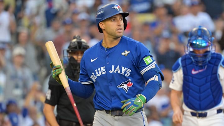 Oct 27, 2025; Los Angeles, California, USA; Toronto Blue Jays right fielder George Springer (4) reacts after striking out against the Los Angeles Dodgers in the first inning during game three of the 2025 MLB World Series at Dodger Stadium. Oct 27, 2025; Los Angeles, California, USA; Toronto Blue Jays right fielder George Springer (4) reacts after striking out against the Los Angeles Dodgers in the first inning during game three of the 2025 MLB World Series at Dodger Stadium.