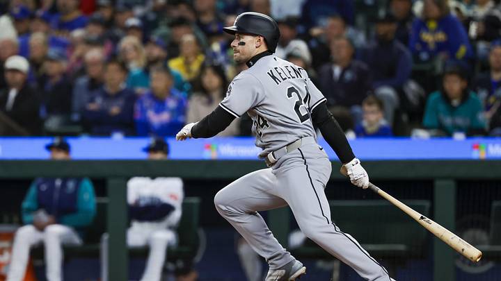May 19, 2026; Seattle, Washington, USA; Chicago White Sox right fielder Jarred Kelenic (24) hits a single against the Seattle Mariners during the eighth inning at T-Mobile Park. Mandatory Credit: Joe Nicholson-Imagn Images