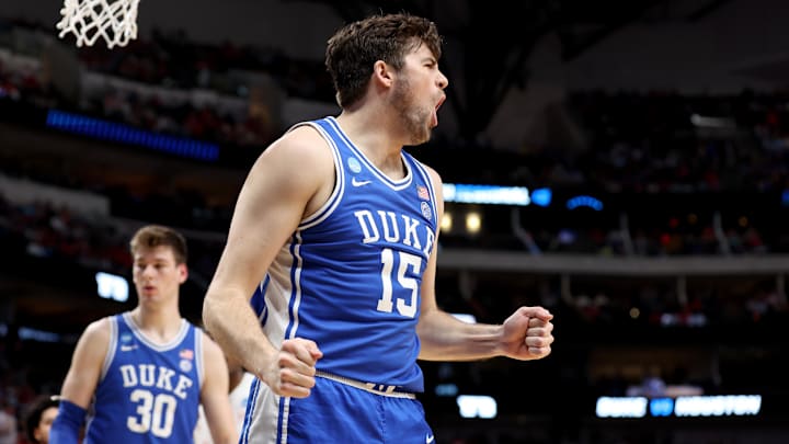 Mar 29, 2024; Dallas, TX, USA; Duke Blue Devils center Ryan Young (15) reacts after a play during the first half in the semifinals of the South Regional of the 2024 NCAA Tournament against the Houston Cougars at American Airlines Center. Mandatory Credit: Tim Heitman-Imagn Images 