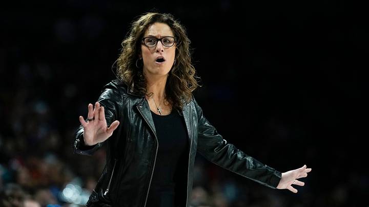 Indiana Fever head coach Stephanie White reacts during a WNBA playoff game.