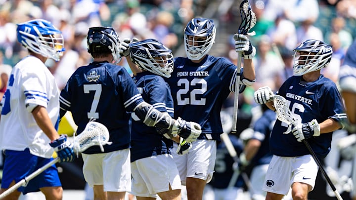 Penn State Nittany Lions midfielder Matt Traynor (22) celebrates with teammates after scoring against Duke during the 2023 NCAA Men's Lacrosse Tournament semifinals. Penn State Nittany Lions midfielder Matt Traynor (22) celebrates with teammates after scoring against Duke during the 2023 NCAA Men's Lacrosse Tournament semifinals.