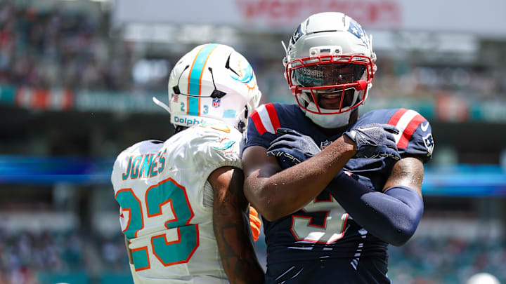 Sep 14, 2025; Miami Gardens, Florida, USA; New England Patriots wide receiver Kayshon Boutte (9) races after scoring a touchdown against the Miami Dolphins in the first quarter  at Hard Rock Stadium. Mandatory Credit: Nathan Ray Seebeck-Imagn Images