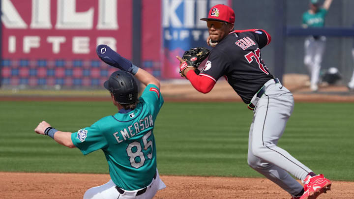 Feb 26, 2026:Cleveland Guardians third baseman Angel Genao (73) gets the force out against Seattle Mariners shortstop Colt Emerson (85) in the second inning at Peoria Sports Complex. 