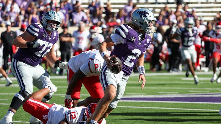 Oct 10, 2026; Manhattan, Kansas, USA; Kansas State Wildcats quarterback Avery Johnson (2) gets away from Houston Cougars linebacker Sione Fotu (12) during the second quarter at Bill Snyder Family Football Stadium. Mandatory Credit: Scott Sewell-Imagn Images Oct 10, 2026; Manhattan, Kansas, USA; Kansas State Wildcats quarterback Avery Johnson (2) gets away from Houston Cougars linebacker Sione Fotu (12) during the second quarter at Bill Snyder Family Football Stadium. Mandatory Credit: Scott Sewell-Imagn Images