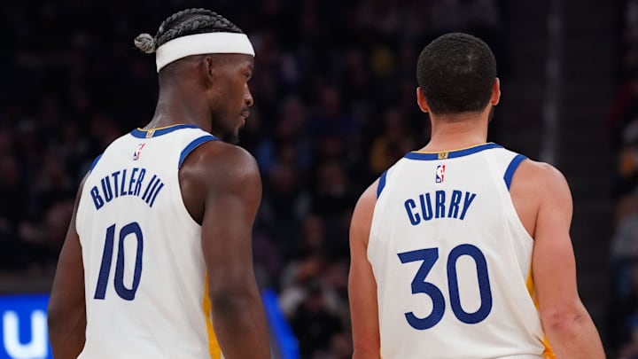 Mar 8, 2025; San Francisco, California, USA; Golden State Warriors forward Jimmy Butler III (10) talks with guard Stephen Curry (30) during a game against the Detroit Pistons in the second quarter at Chase Center. Mandatory Credit: David Gonzales-Imagn Images
