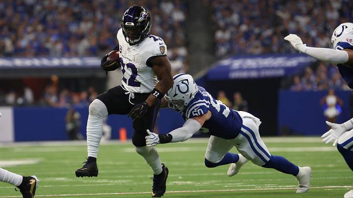 Sep 13, 2026; Indianapolis, Indiana, USA; Baltimore Ravens running back Derrick Henry (22) runs with the ball past Indianapolis Colts linebacker Bryce Boettcher (50) during the second half at Lucas Oil Stadium. Mandatory Credit: Trevor Ruszkowski-Imagn Images Sep 13, 2026; Indianapolis, Indiana, USA; Baltimore Ravens running back Derrick Henry (22) runs with the ball past Indianapolis Colts linebacker Bryce Boettcher (50) during the second half at Lucas Oil Stadium. Mandatory Credit: Trevor Ruszkowski-Imagn Images