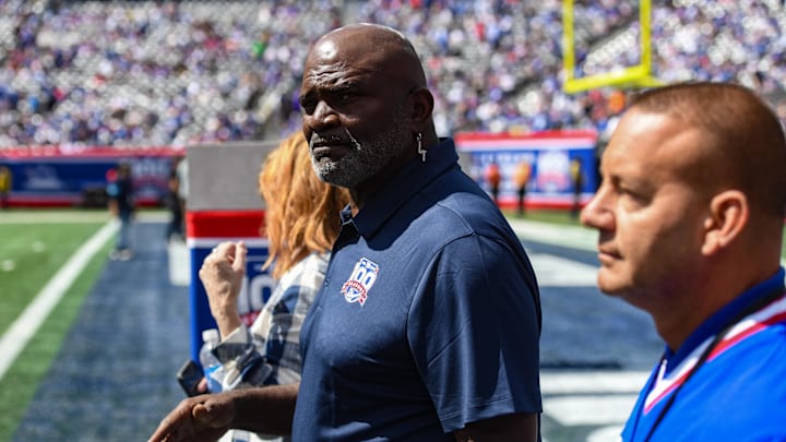 Sep 8, 2024; East Rutherford, New Jersey, USA; New York Giants legend Lawrence Taylor enters the field before a game between the New York Giants and the Minnesota Vikings at MetLife Stadium.  