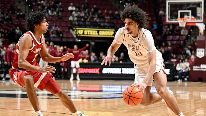 Jan 31, 2026; Tallahassee, Florida, USA; Florida State Seminoles guard Lajae Jones (10) drives the ball past Stanford Cardinal guard Ryan Agarwal (11) during the first half at Donald L. Tucker Center. Mandatory Credit: Melina Myers-Imagn Images Jan 31, 2026; Tallahassee, Florida, USA; Florida State Seminoles guard Lajae Jones (10) drives the ball past Stanford Cardinal guard Ryan Agarwal (11) during the first half at Donald L. Tucker Center. Mandatory Credit: Melina Myers-Imagn Images