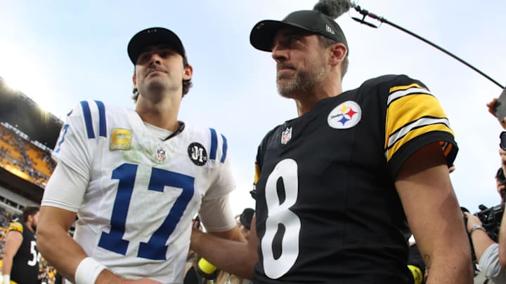 Nov 2, 2025; Pittsburgh, Pennsylvania, USA; Pittsburgh Steelers quarterback Aaron Rodgers (8) and Indianapolis Colts quarterback Daniel Jones (17) shake hands after the game at Acrisure Stadium. Mandatory Credit: Charles LeClaire-Imagn Images