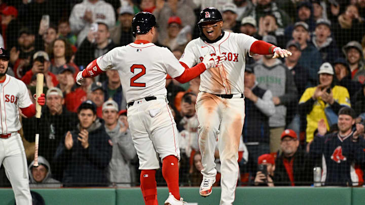 Apr 6, 2025; Boston, Massachusetts, USA; Boston Red Sox third baseman Alex Bregman (2) celebrates a three run home run against the St. Louis Cardinals with designated hitter Rafael Devers (11) during the third inning at Fenway Park. Mandatory Credit: Eric Canha-Imagn Images Apr 6, 2025; Boston, Massachusetts, USA; Boston Red Sox third baseman Alex Bregman (2) celebrates a three run home run against the St. Louis Cardinals with designated hitter Rafael Devers (11) during the third inning at Fenway Park. Mandatory Credit: Eric Canha-Imagn Images
