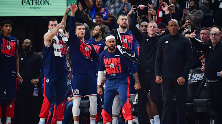 Apr 24, 2025; Inglewood, California, USA; Los Angeles Clippers guard Patty Mills (88) and the bench react against the Denver Nuggets during the first half of game three in the first round for the 2024 NBA Playoffs at Intuit Dome. Mandatory Credit: Gary A. Vasquez-Imagn Images