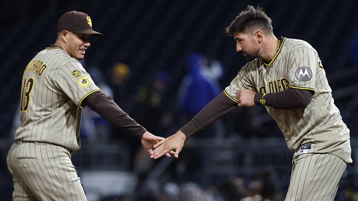 Apr 6, 2026; Pittsburgh, Pennsylvania, USA;  San Diego Padres third baseman Manny Machado (13) and designated hitter Nick Castellanos (right) celebrate after defeating the Pittsburgh Pirates at PNC Park. Mandatory Credit: Charles LeClaire-Imagn Images