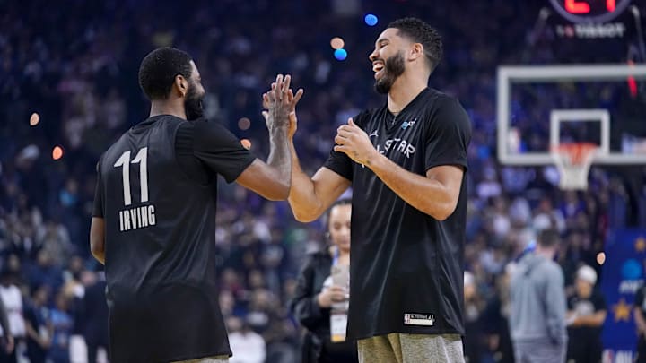 Former Duke basketball players Kyrie Irving and Jayson Tatum