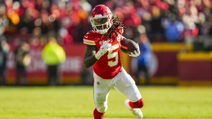 Dec 21, 2024; Kansas City, Missouri, USA; Kansas City Chiefs wide receiver Hollywood Brown (5) runs with the ball during the first half against the Houston Texans at GEHA Field at Arrowhead Stadium. Mandatory Credit: Jay Biggerstaff-Imagn Images
