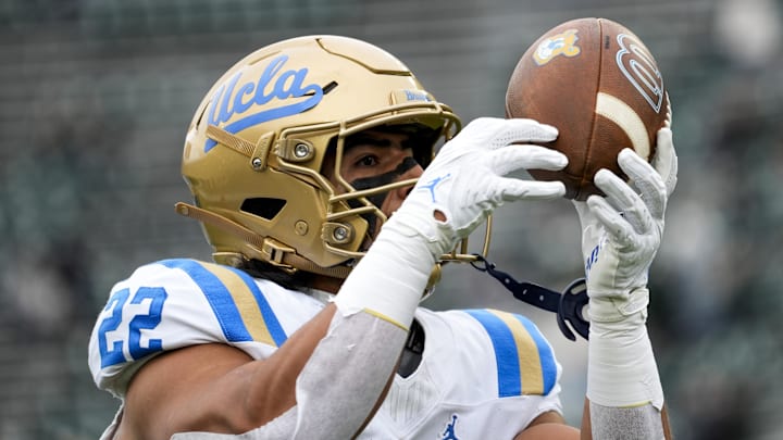 Oct 11, 2025; East Lansing, Michigan, USA; UCLA Bruins unning back Anthony Frias II (22) catches a pass during warmups before a game at Spartan Stadium. Mandatory Credit: Brendan Mullin-Imagn Images Oct 11, 2025; East Lansing, Michigan, USA; UCLA Bruins unning back Anthony Frias II (22) catches a pass during warmups before a game at Spartan Stadium. Mandatory Credit: Brendan Mullin-Imagn Images