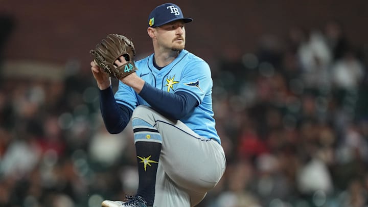Aug 16, 2025; San Francisco, California, USA; Tampa Bay Rays relief pitcher Bryan Baker (47) throws a pitch against the San Francisco Giants during the eighth inning at Oracle Park. Mandatory Credit: Darren Yamashita-Imagn Images