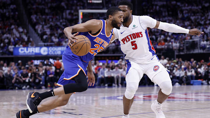 May 1, 2025; Detroit, Michigan, USA; New York Knicks forward Mikal Bridges (25) dribbles defended by Detroit Pistons guard Malik Beasley (5) in the first half during game six of first round for the 2024 NBA Playoffs at Little Caesars Arena. Mandatory Credit: Rick Osentoski-Imagn Images