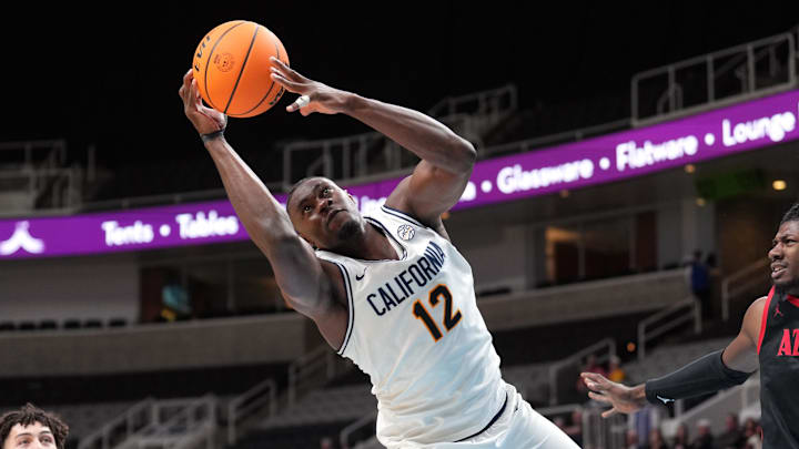 Dec 21, 2024; San Jose, California, USA; California Golden Bears center Mady Sissoko (12) rebounds against the San Diego State Aztecs during the second half at SAP Center. Mandatory Credit: Darren Yamashita-Imagn Images Dec 21, 2024; San Jose, California, USA; California Golden Bears center Mady Sissoko (12) rebounds against the San Diego State Aztecs during the second half at SAP Center. Mandatory Credit: Darren Yamashita-Imagn Images