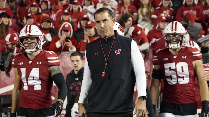 Nov 16, 2024; Madison, Wisconsin, USA; Wisconsin Badgers head coach Luke Fickell during warmups prior to the game against the Oregon Ducks at Camp Randall Stadium. Mandatory Credit: Jeff Hanisch-Imagn Images Nov 16, 2024; Madison, Wisconsin, USA; Wisconsin Badgers head coach Luke Fickell during warmups prior to the game against the Oregon Ducks at Camp Randall Stadium. Mandatory Credit: Jeff Hanisch-Imagn Images
