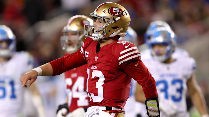 Dec 30, 2024; Santa Clara, California, USA; San Francisco 49ers quarterback Brock Purdy (13) celebrates after scoring a touchdown during the second quarter against the Detroit Lions at Levi's Stadium. Mandatory Credit: Sergio Estrada-Imagn Images Dec 30, 2024; Santa Clara, California, USA; San Francisco 49ers quarterback Brock Purdy (13) celebrates after scoring a touchdown during the second quarter against the Detroit Lions at Levi's Stadium. Mandatory Credit: Sergio Estrada-Imagn Images
