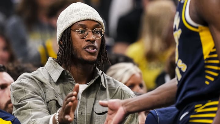 Oct 30, 2024; Indianapolis, Indiana, USA; Indiana Pacers center Myles Turner (33) high-fives his teammates during a game against the Boston Celtics at Gainbridge Fieldhouse. Mandatory Credit: Grace Smith-Imagn Images