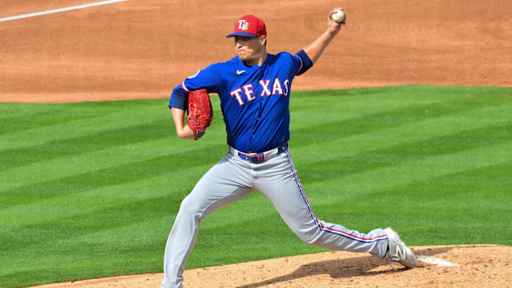 Feb 23, 2026; Tempe, Arizona, USA; Texas Rangers pitcher Robert Garcia (62) throws in the fourth inning against the Los Angeles Angels during a spring training game at Tempe Diablo Stadium. Mandatory Credit: Matt Kartozian-Imagn Images Feb 23, 2026; Tempe, Arizona, USA; Texas Rangers pitcher Robert Garcia (62) throws in the fourth inning against the Los Angeles Angels during a spring training game at Tempe Diablo Stadium. Mandatory Credit: Matt Kartozian-Imagn Images