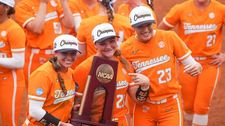 Tennessee outfielder Gabby Leach (55), Tennessee utility Ella Dodge (25) and Tennessee pitcher Karlyn Pickens (23) pose with the trophy after winning a NCAA super regional game between Tennessee and Georgia, advancing to the Women’s College World Series at Sherri Parker Lee Stadium in Knoxville, Tenn., on May 22, 2026. Tennessee outfielder Gabby Leach (55), Tennessee utility Ella Dodge (25) and Tennessee pitcher Karlyn Pickens (23) pose with the trophy after winning a NCAA super regional game between Tennessee and Georgia, advancing to the Women’s College World Series at Sherri Parker Lee Stadium in Knoxville, Tenn., on May 22, 2026.