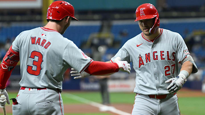 Apr 17, 2024; St. Petersburg, Florida, USA; Los Angeles Angels center fielder Mike Trout (27) celebrates with designated hitter Taylor Ward (3) after hitting a solo home run in the first inning against the Tampa Bay Rays at Tropicana Field. Mandatory Credit: Jonathan Dyer-Imagn Images Apr 17, 2024; St. Petersburg, Florida, USA; Los Angeles Angels center fielder Mike Trout (27) celebrates with designated hitter Taylor Ward (3) after hitting a solo home run in the first inning against the Tampa Bay Rays at Tropicana Field. Mandatory Credit: Jonathan Dyer-Imagn Images