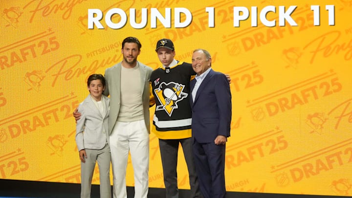 Jun 27, 2025; Los Angeles, California, USA; Benjamin Kindel is selected as the 11th overall pick to the Pittsburgh Penguins in the first round of the 2025 NHL Draft at Peacock Theater. Mandatory Credit: Kirby Lee-Imagn Images