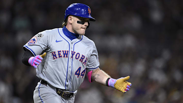 Aug 24, 2024; San Diego, California, USA; New York Mets center fielder Harrison Bader (44) celebrates while rounding the bases after hitting a home run against the San Diego Padres during the eighth inning at Petco Park.