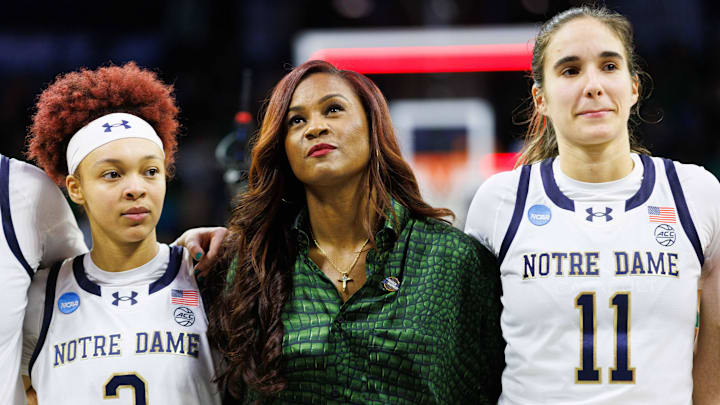 Notre Dame head coach Niele Ivey, center, guards Hannah Hidalgo (3) and Sonia Citron (11) look on after winning the second round of the NCAA Women's Basketball Tournament 76-55 against Michigan at Purcell Pavilion on Sunday, March 23, 2025, in South Bend. Notre Dame head coach Niele Ivey, center, guards Hannah Hidalgo (3) and Sonia Citron (11) look on after winning the second round of the NCAA Women's Basketball Tournament 76-55 against Michigan at Purcell Pavilion on Sunday, March 23, 2025, in South Bend.
