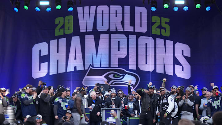 Feb 11, 2026; Seattle, WA, USA; Seattle Seahawks linebacker Ernest Jones IV (13) speaks during the Super Bowl LX trophy celebration at Lumen Field.