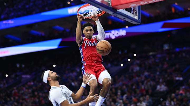 Dec 6, 2024; Philadelphia, Pennsylvania, USA; Philadelphia 76ers forward KJ Martin (1) dunks against Orlando Magic guard Jalen Suggs (4) in the fourth quarter at Wells Fargo Center. Mandatory Credit: Kyle Ross-Imagn Images