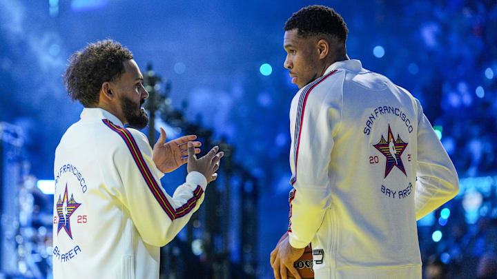 Trae Young #11 of the Atlanta Hawks speaks with Giannis Antetokounmpo #34 of the Milwaukee Bucks during the 2025 All-Star Game.