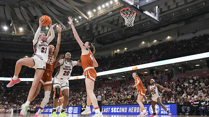 Mar 9, 2025; Greenville, SC, USA; South Carolina Gamecocks forward Chloe Kitts (21) shoots over Texas Longhorns forward Taylor Jones (44) during the second half at Bon Secours Wellness Arena. Mandatory Credit: Jim Dedmon-Imagn Images Mar 9, 2025; Greenville, SC, USA; South Carolina Gamecocks forward Chloe Kitts (21) shoots over Texas Longhorns forward Taylor Jones (44) during the second half at Bon Secours Wellness Arena. Mandatory Credit: Jim Dedmon-Imagn Images