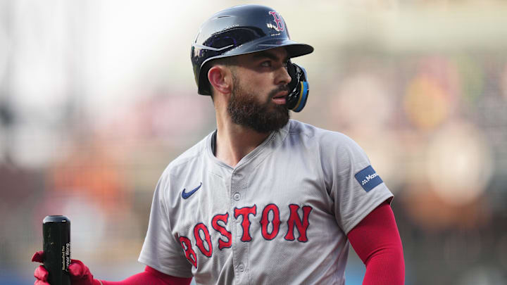 Jul 23, 2024; Denver, Colorado, USA; Boston Red Sox catcher Connor Wong (12) looks back after striking out in the first inning against the Colorado Rockies at Coors Field. Mandatory Credit: Ron Chenoy-Imagn Images