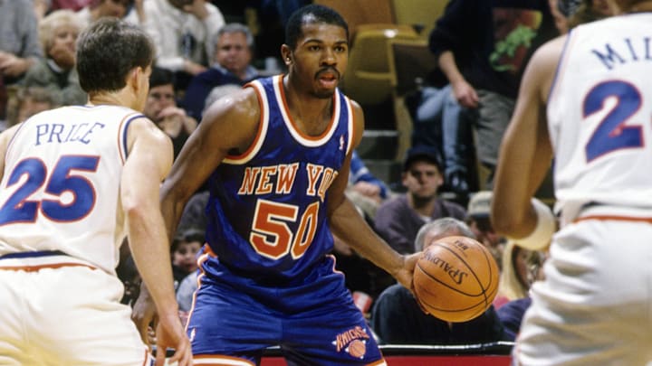 Mar 18, 1993; Richfield, OH, USA; FILE PHOTO; New York Knicks guard Greg Anthony (50) is defended by Cleveland Cavaliers guard Mark Price (25) at the Richfield Coliseum. Mandatory Credit: Imagn Images