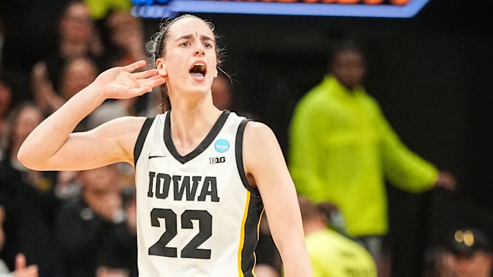 Iowa Hawkeyes guard Caitlin Clark (22) celebrates in the final seconds of a second-round NCAA Tournament game between Iowa and West Virginia, Monday, March 25, 2024 at Carver Hawkeye Arena in Iowa City. Iowa Hawkeyes guard Caitlin Clark (22) celebrates in the final seconds of a second-round NCAA Tournament game between Iowa and West Virginia, Monday, March 25, 2024 at Carver Hawkeye Arena in Iowa City.