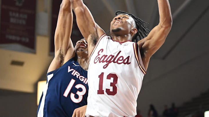 Feb 28, 2024; Chestnut Hill, Massachusetts, USA; Boston College Eagles guard Donald Hand Jr. (13) defends against Virginia Cavaliers guard Ryan Dunn (13) during the first half at Conte Forum. Mandatory Credit: Eric Canha-Imagn Images Feb 28, 2024; Chestnut Hill, Massachusetts, USA; Boston College Eagles guard Donald Hand Jr. (13) defends against Virginia Cavaliers guard Ryan Dunn (13) during the first half at Conte Forum. Mandatory Credit: Eric Canha-Imagn Images