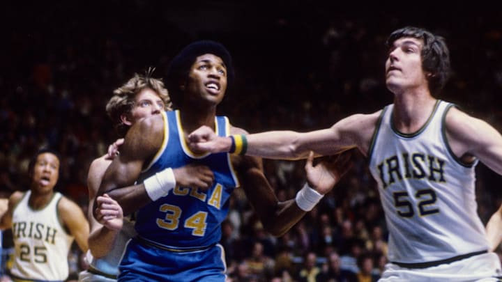 Jan 22, 1978; South Bend, IN, USA; FILE PHOTO; UCLA Bruins forward David Greenwood (34) in action against Notre Dame Irish center Bill Laimbeer (52) at the Joyce Center during the 1977-78 season. Mandatory Credit: Malcolm Emmons-Imagn Images